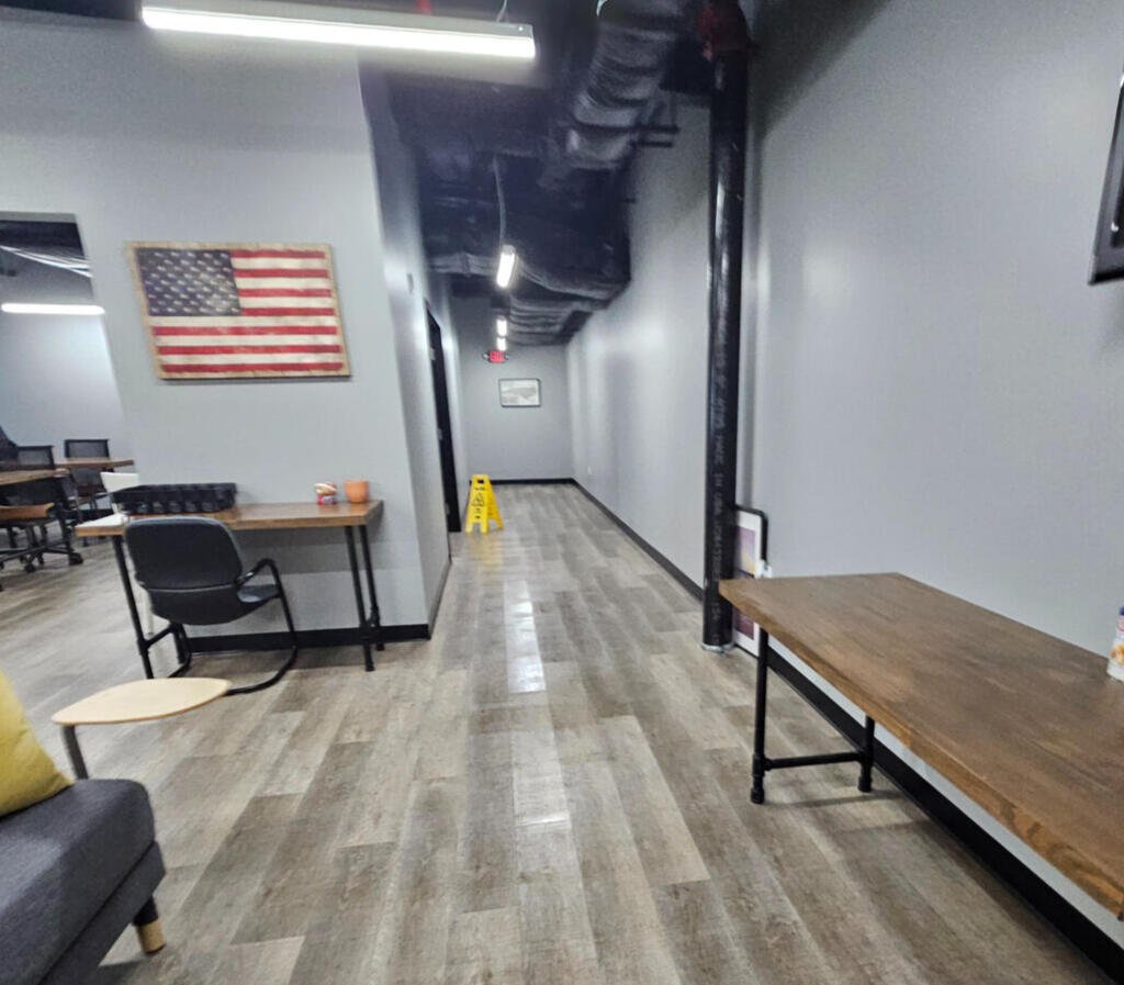 Crown Cleaning Solutions, LLC cleaning photo after service Clean breakroom image of hallway and tables